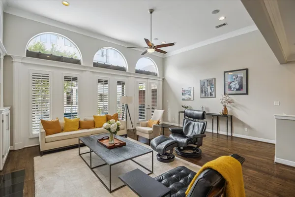 a kitchen with stainless steel appliances granite countertop a sink a stove a refrigerator and a refrigerator