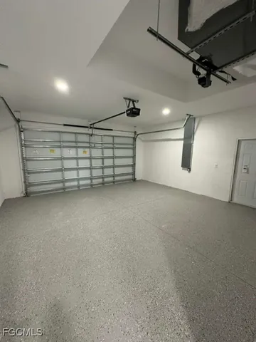 a view of a porch with wooden floor and a yard