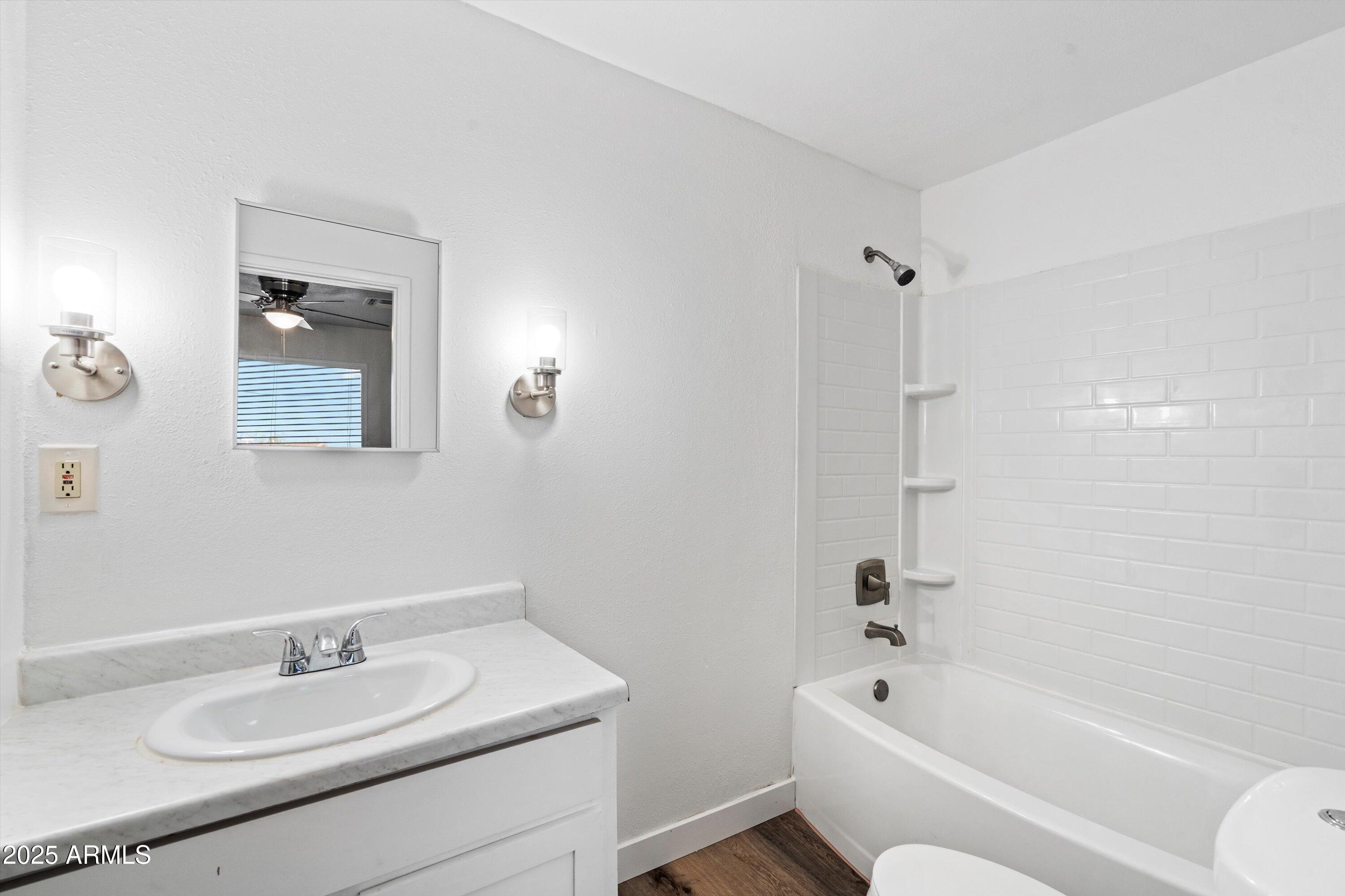 37701 West Buckeye Road Tonopah, AZ 85354 - Photo 20 of 35 a bathroom with a sink a toilet and bathtub