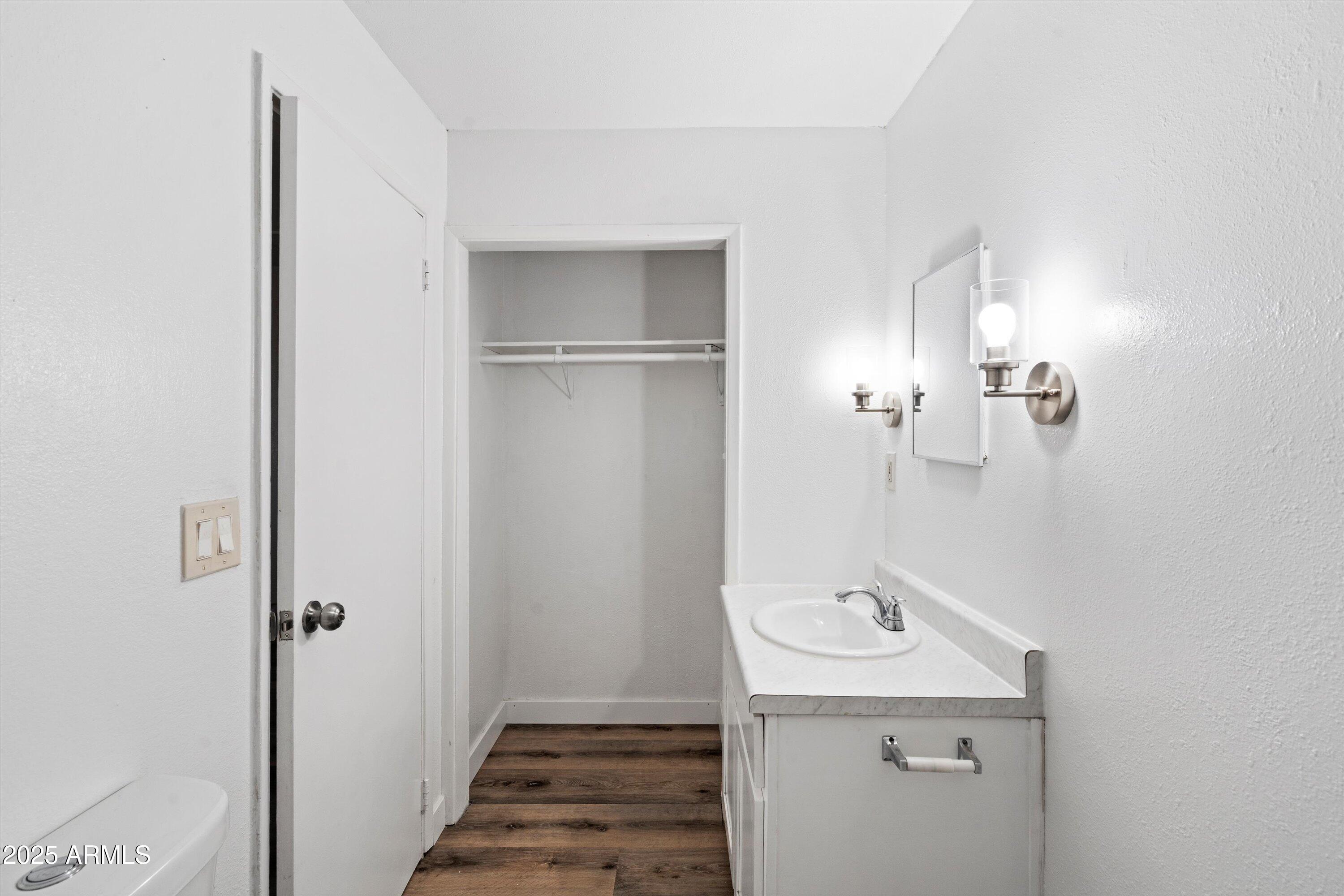 37701 West Buckeye Road Tonopah, AZ 85354 - Photo 21 of 35 a bathroom with a sink a toilet and shower