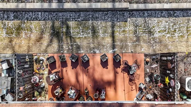 a view of pathway along with wooden fence