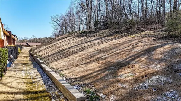 an aerial view of a house with mountain view