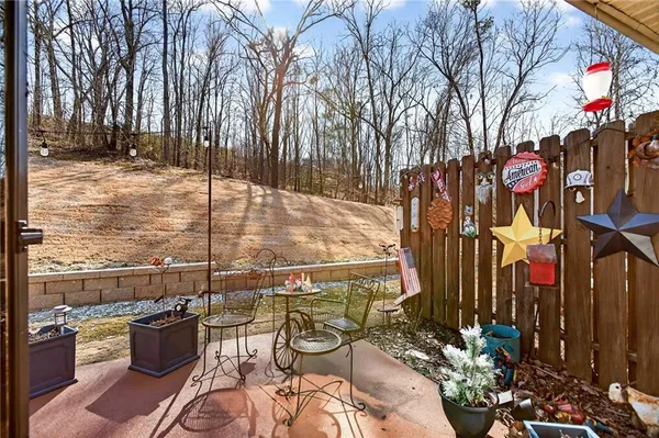 a view of walk in closet with clothes