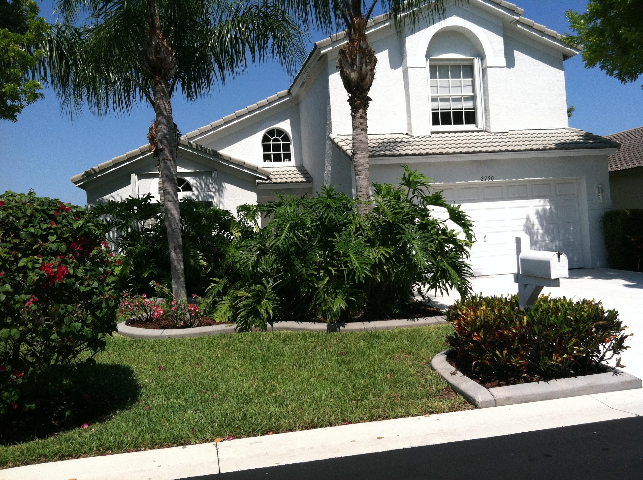 2750 Pointe Circle Greenacres, FL 33413 - Photo 2 of 14 exterior front