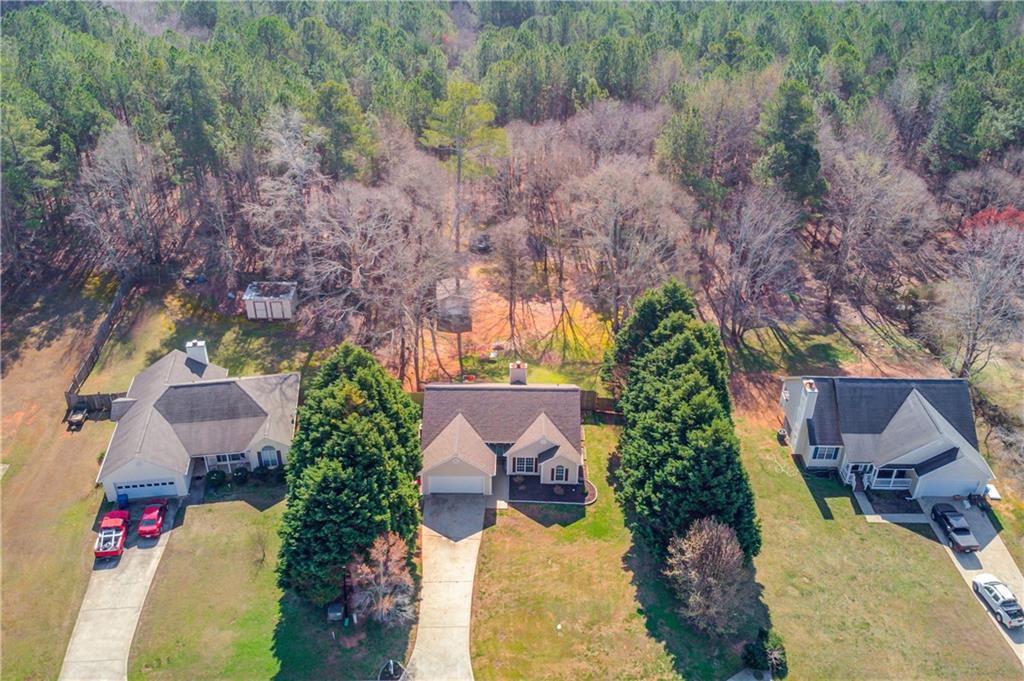 504 Oxford Ridge Winder, GA 30680 - Photo 2 of 30 an aerial view of house with yard and mountain view in back