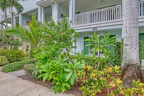 front view of a house with a garden