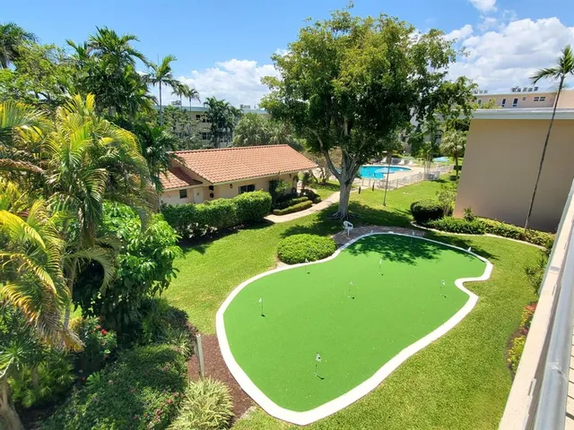 an empty room with sliding glass door