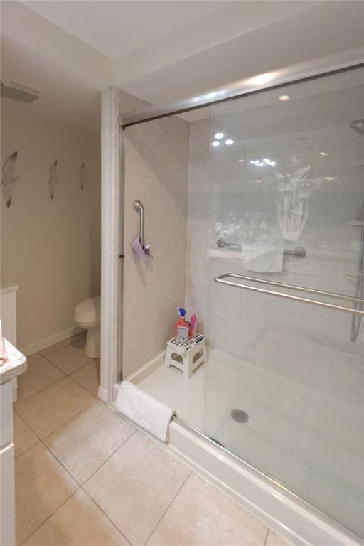 10350 Imperial Point Drive West, Unit 4 Largo, FL 33774 - Photo 16 of 68 a bathroom with a shower and a sink