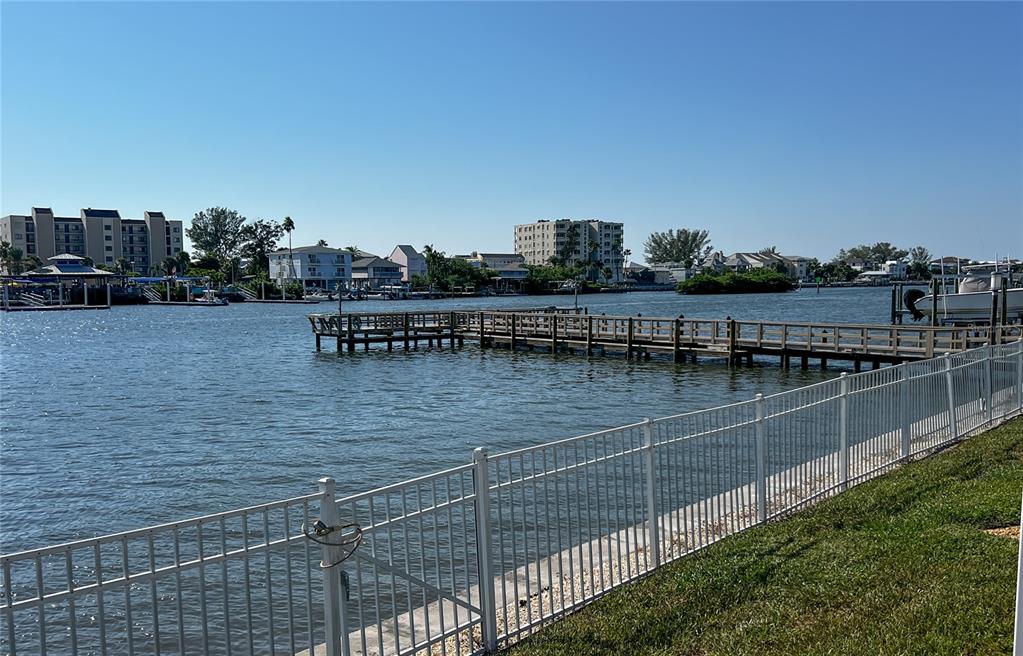 10350 Imperial Point Drive West, Unit 4 Largo, FL 33774 - Photo 29 of 68 a view of a lake