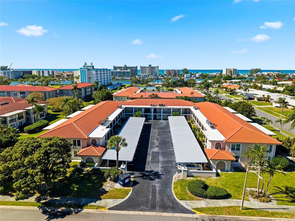 10350 Imperial Point Drive West, Unit 4 Largo, FL 33774 - Photo 46 of 68 an aerial view of a house with swimming pool outdoor space and seating