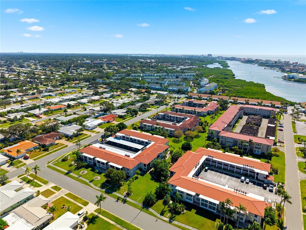 10350 Imperial Point Drive West, Unit 4 Largo, FL 33774 - Photo 56 of 68 an aerial view of residential houses with outdoor space