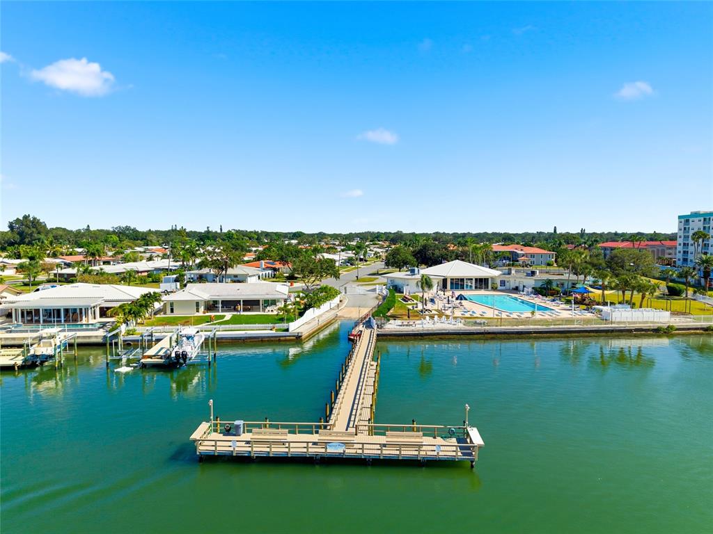 10350 Imperial Point Drive West, Unit 4 Largo, FL 33774 - Photo 59 of 68 a view of a lake with a city
