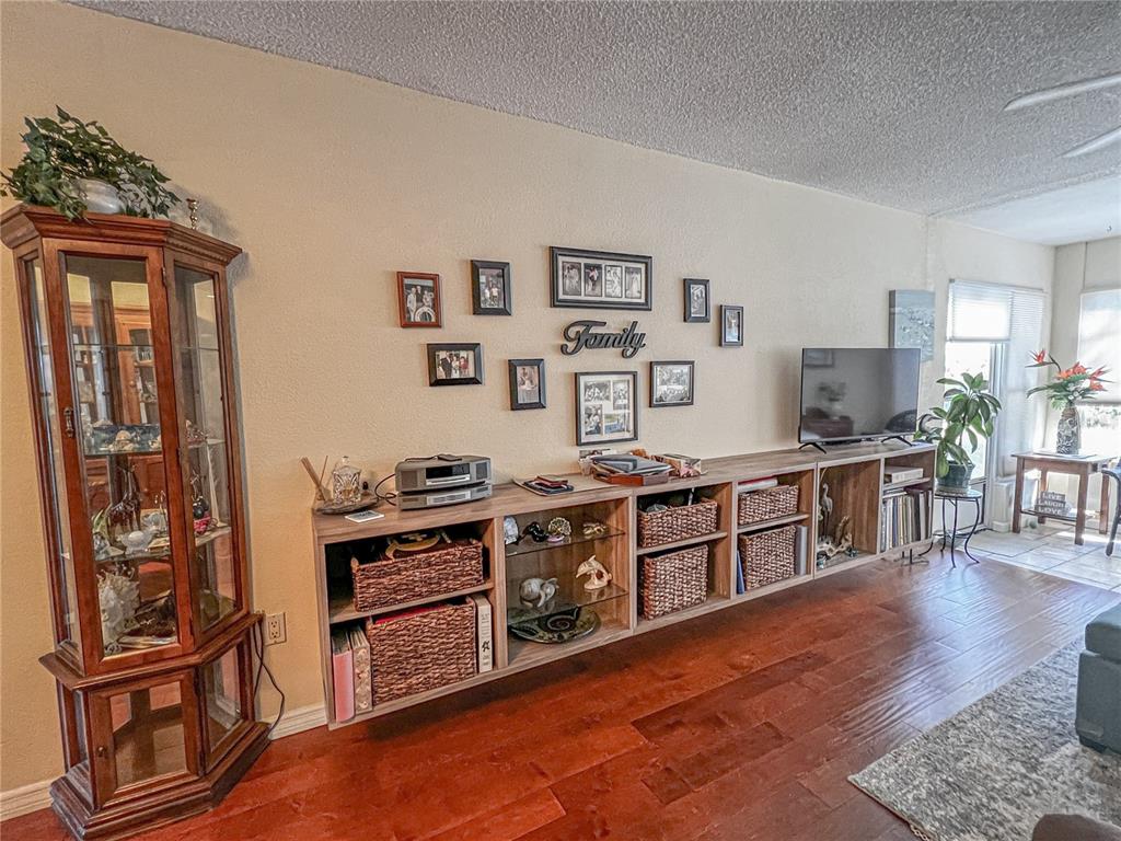10350 Imperial Point Drive West, Unit 4 Largo, FL 33774 - Photo 6 of 68 a kitchen with stainless steel appliances granite countertop a stove and a refrigerator