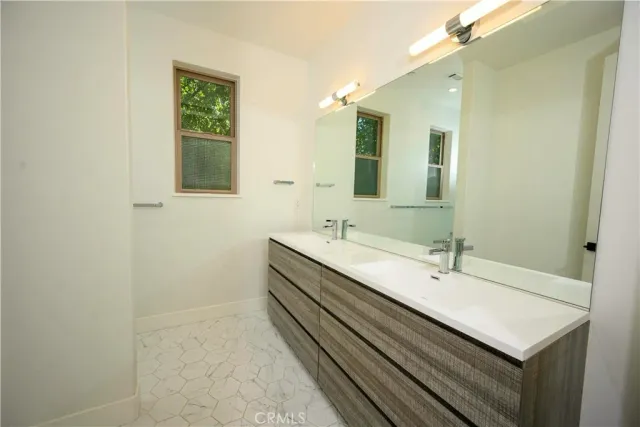 a bathroom with a sink and a toilet