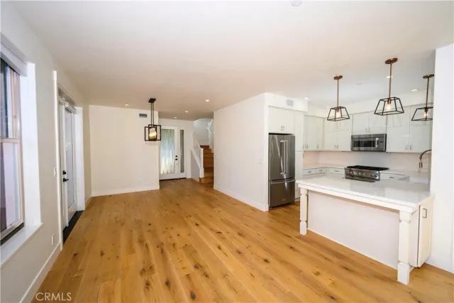 a view of storage and utility room with cabinets