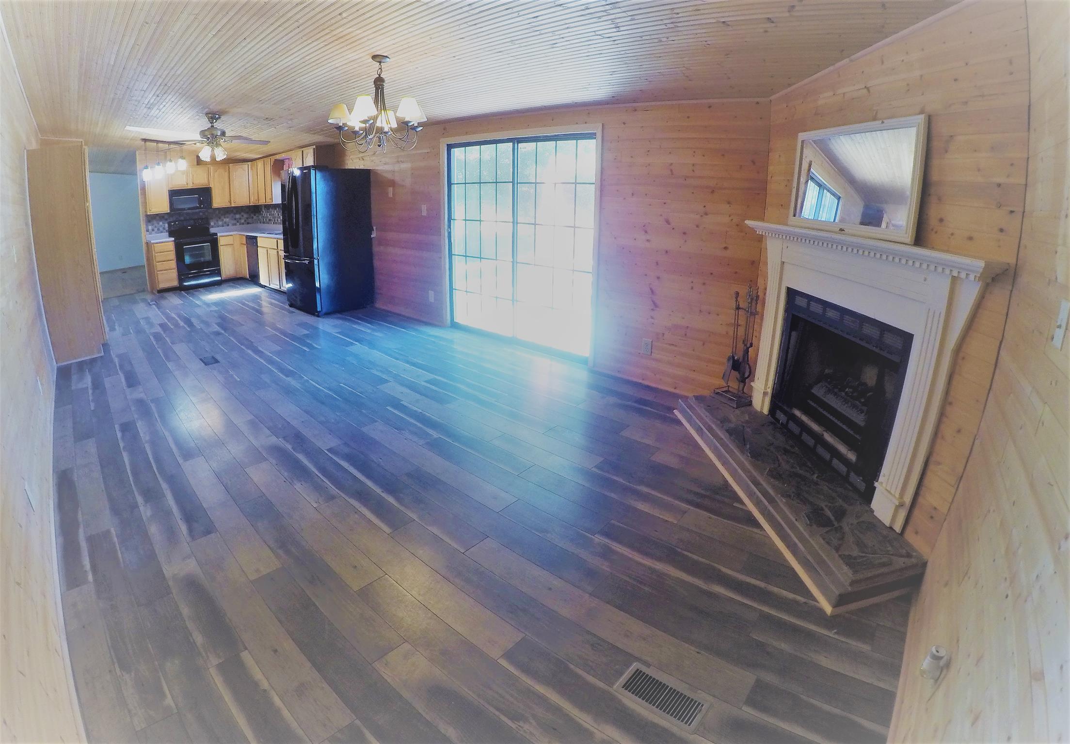 4012 Green Road Springfield, TN 37172 - Photo 8 of 17 a view of a livingroom with wooden floor
