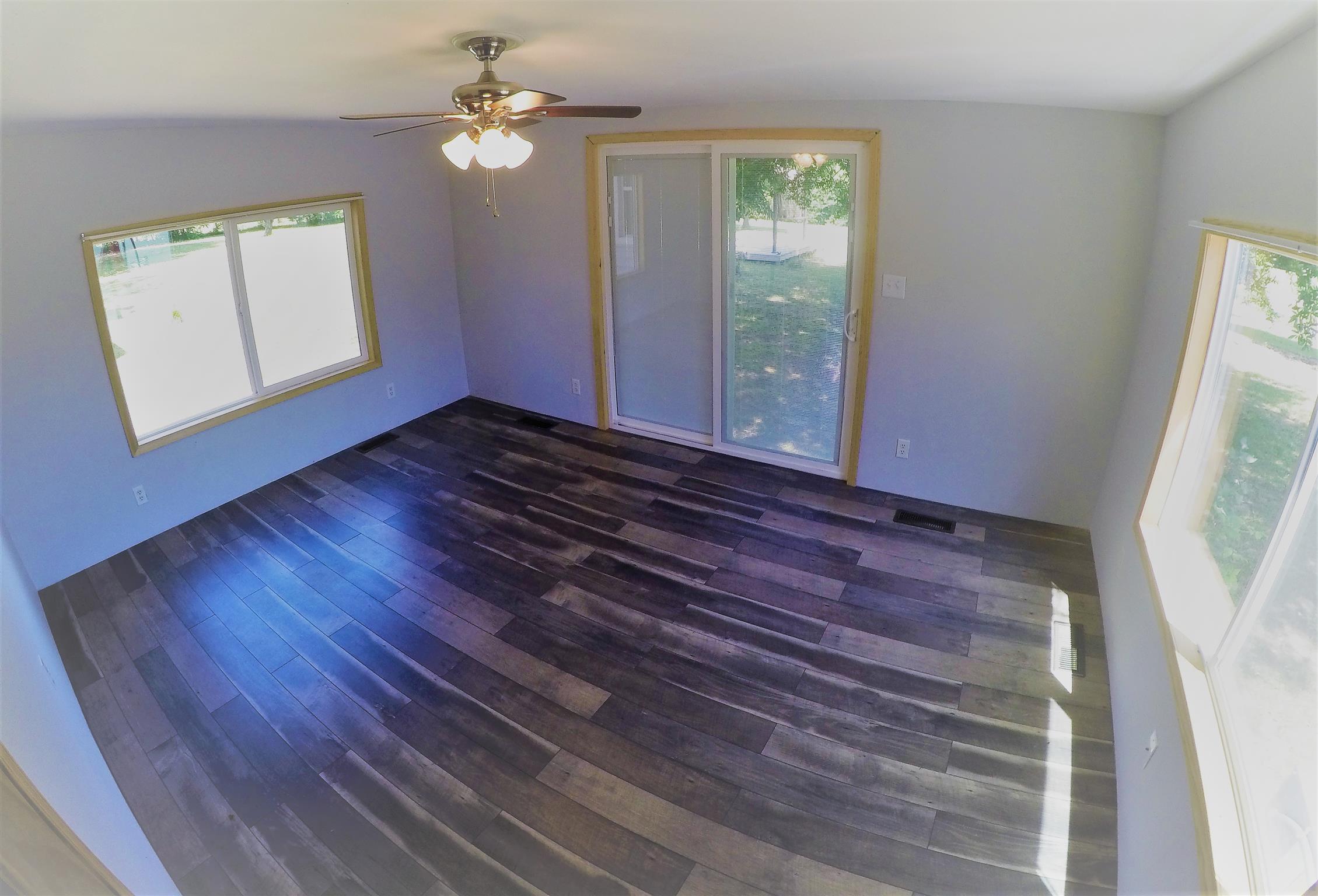 4012 Green Road Springfield, TN 37172 - Photo 10 of 17 wooden floor in an empty room with a window