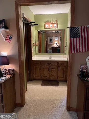 a view of a closet with storage