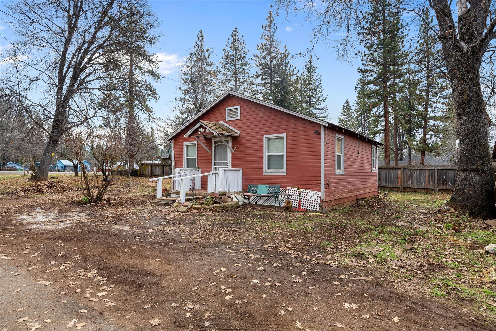 21722 3rd Street Burney, CA 96013 - Photo 19 of 33 a view of a house with a yard