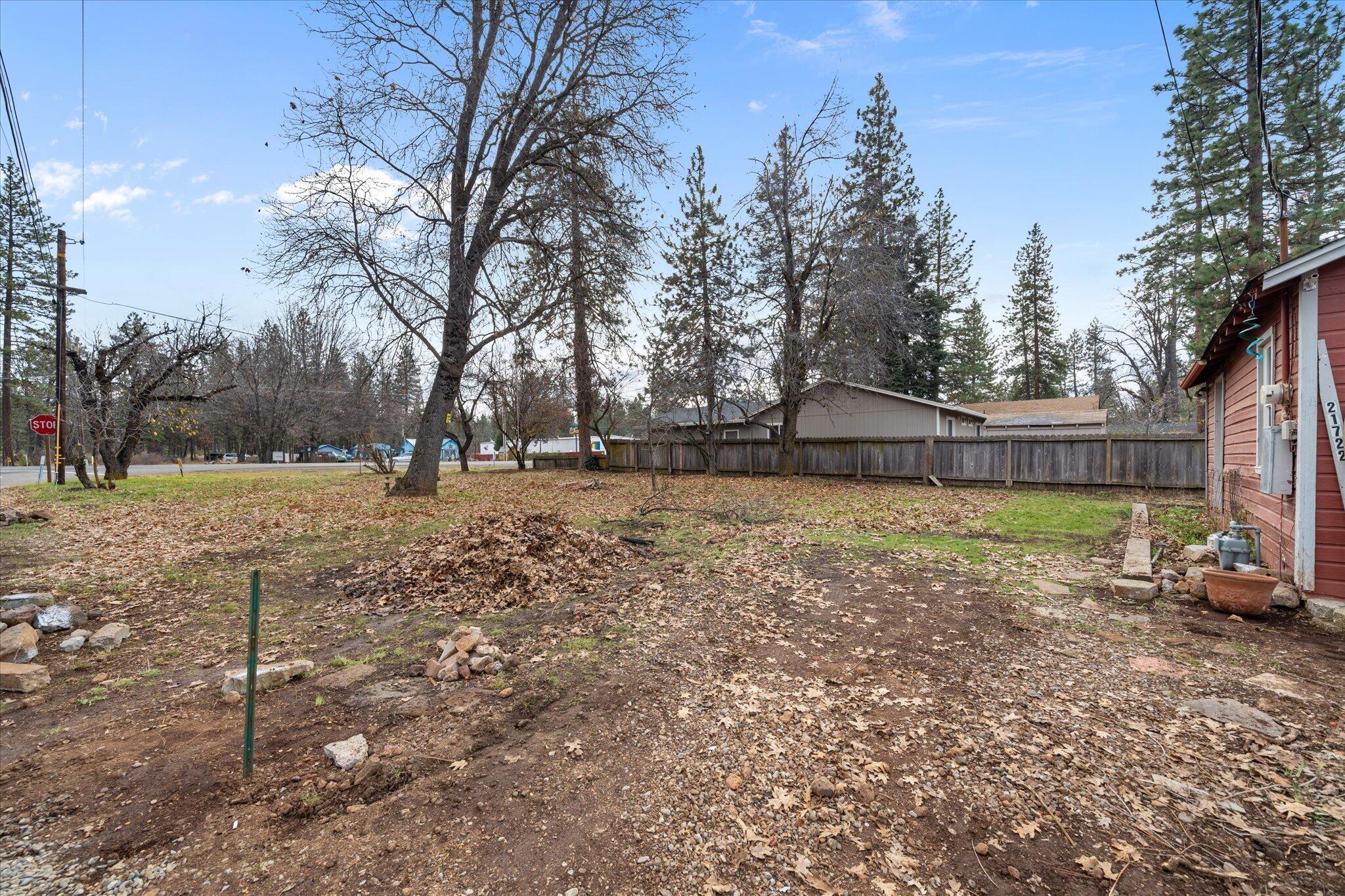 21722 3rd Street Burney, CA 96013 - Photo 22 of 33 a view of a yard with wooden fence