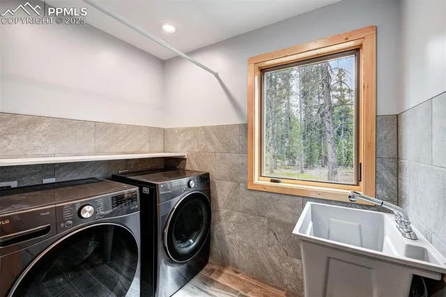 a utility room with dryer and washer
