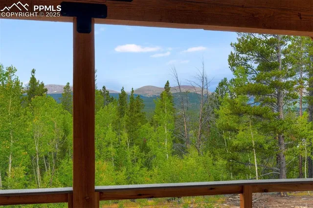 a view of a garden from a balcony