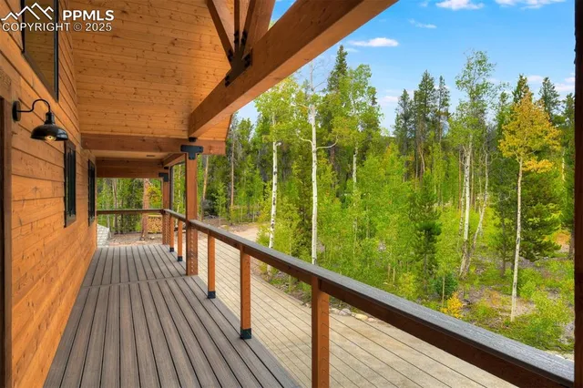 a view of balcony with yard