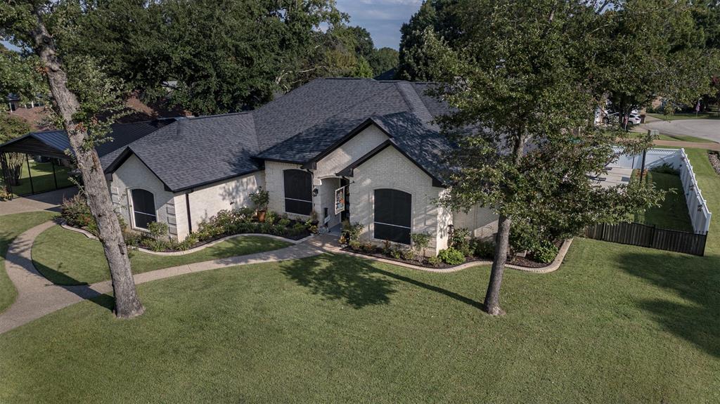 a house with trees in the background