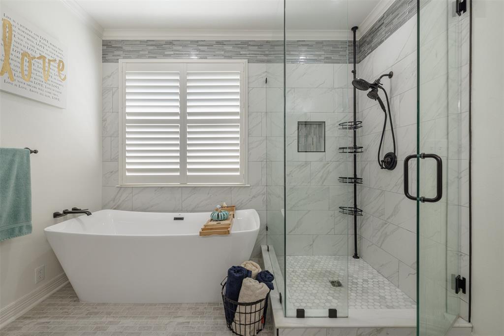 106 Graham Lane Bullard, TX 75757 - Photo 20 of 39 a bathroom with a bathtub and a shower