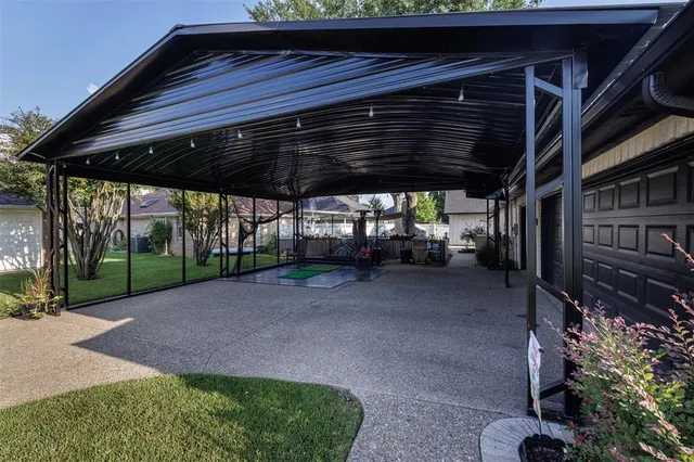 a view of a backyard with pathway