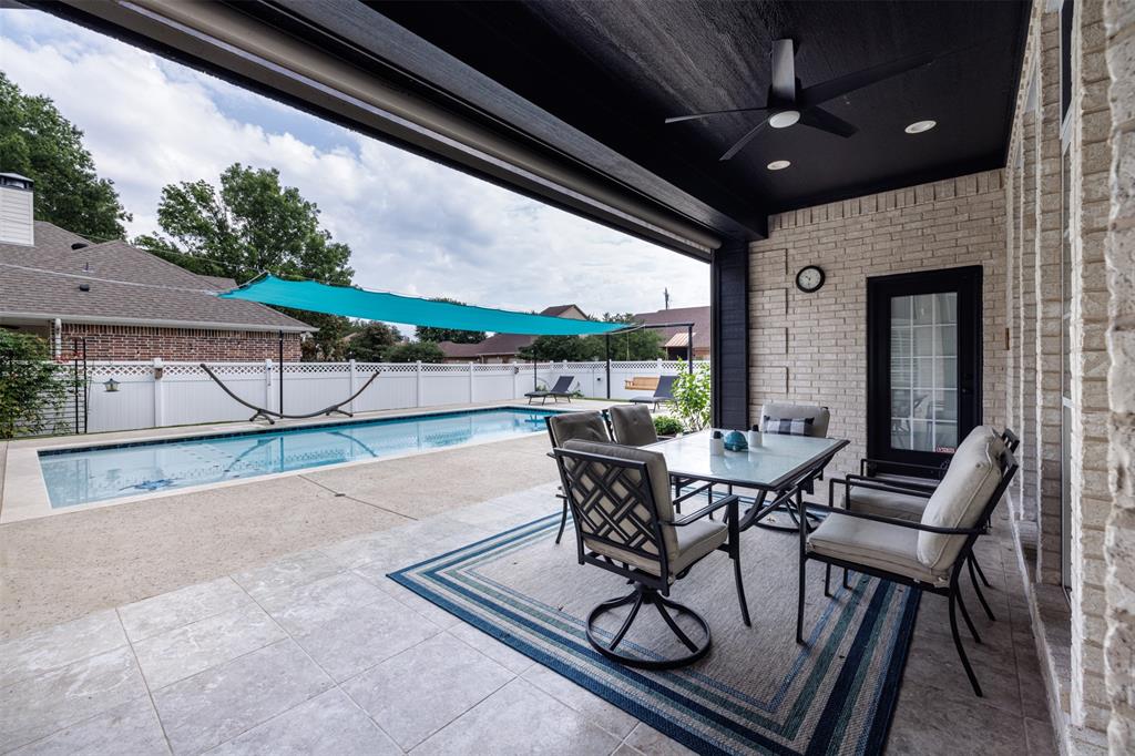 106 Graham Lane Bullard, TX 75757 - Photo 31 of 39 a view of a patio with table and chairs and potted plants