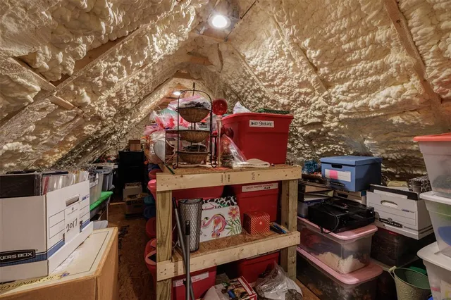 a view of a chairs and table on the wall