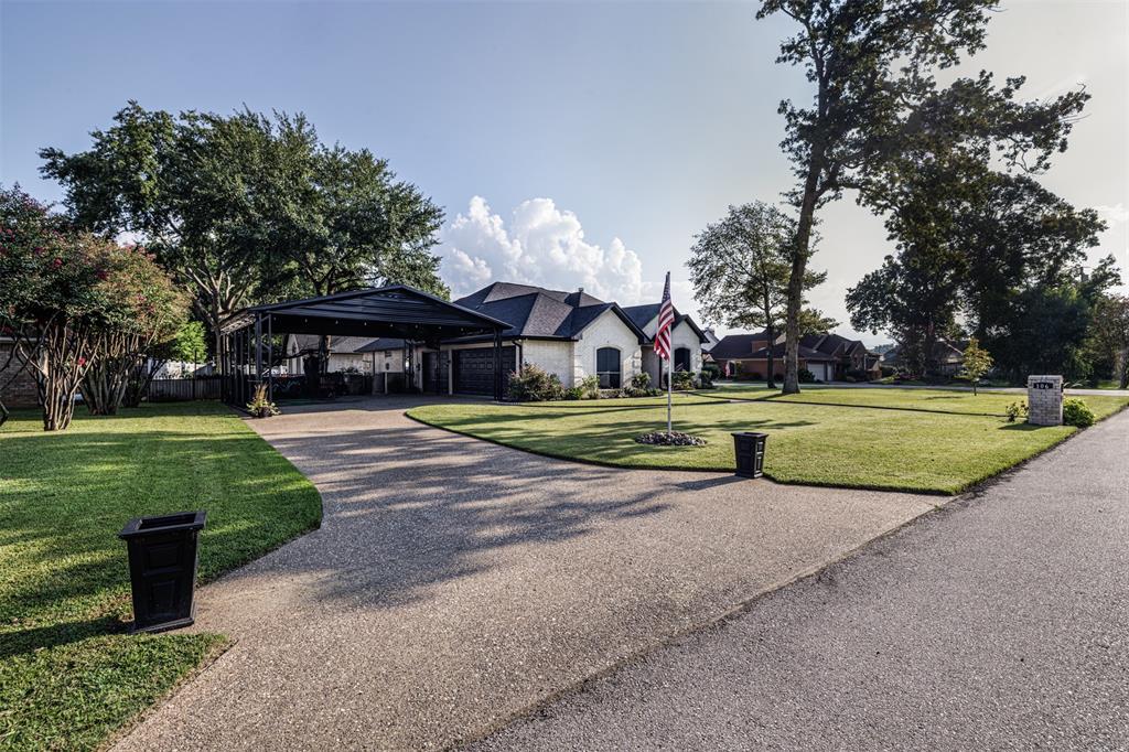106 Graham Lane Bullard, TX 75757 - Photo 4 of 39 a view of a park with large trees