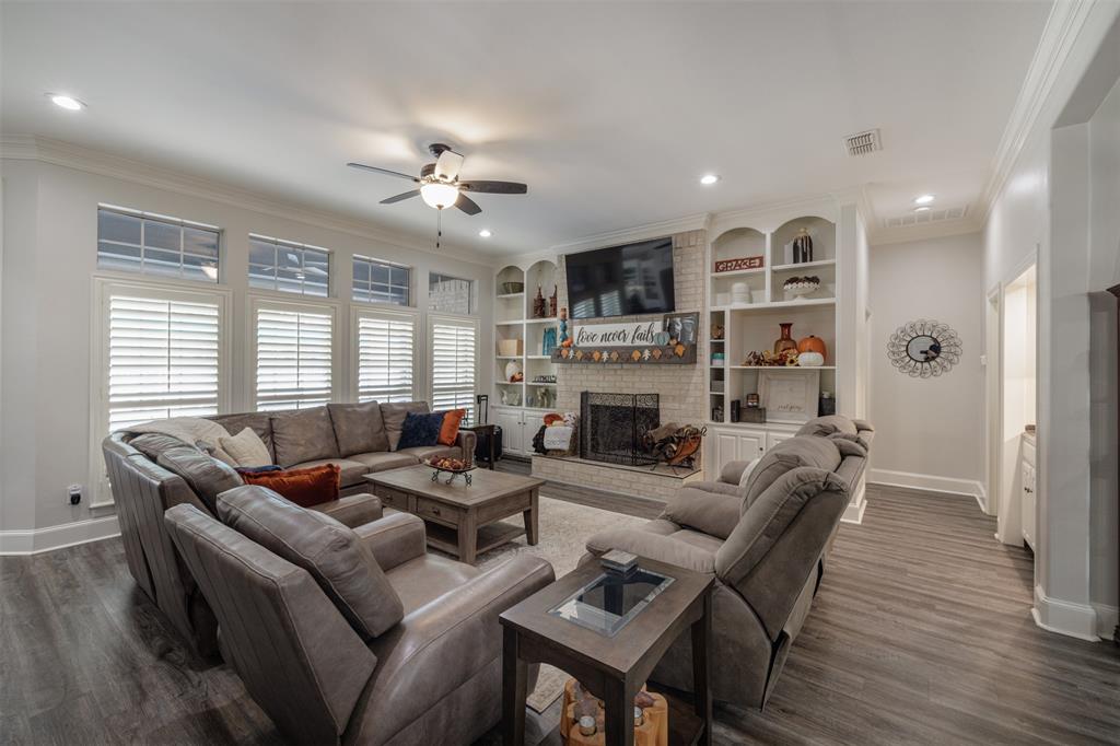 106 Graham Lane Bullard, TX 75757 - Photo 10 of 39 a living room with furniture fireplace and a window