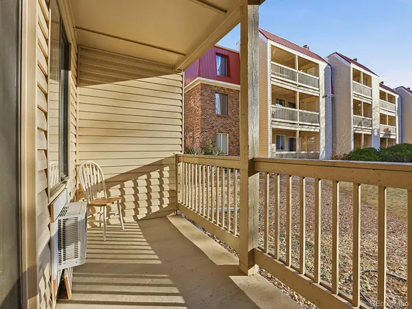 a view of a brick building from a balcony