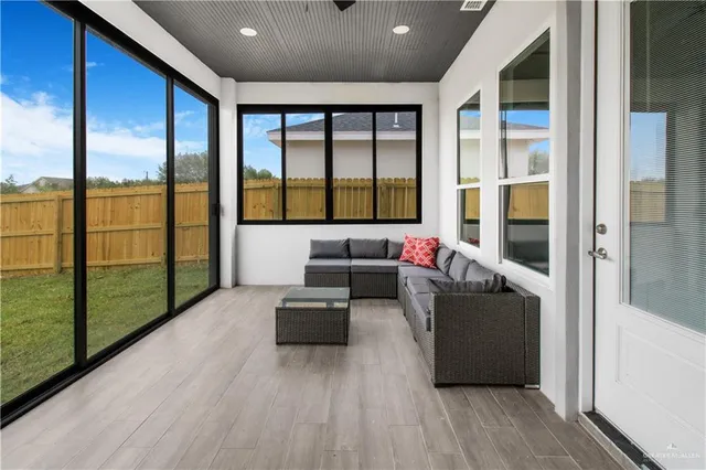 a kitchen with a stove and a refrigerator