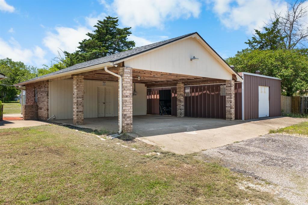 373 Ingred Street Waco, TX 76705 - Photo 22 of 39 a view of a house with a yard and garage