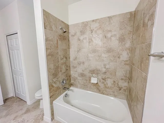 a bathroom with a double vanity sink a and a mirror