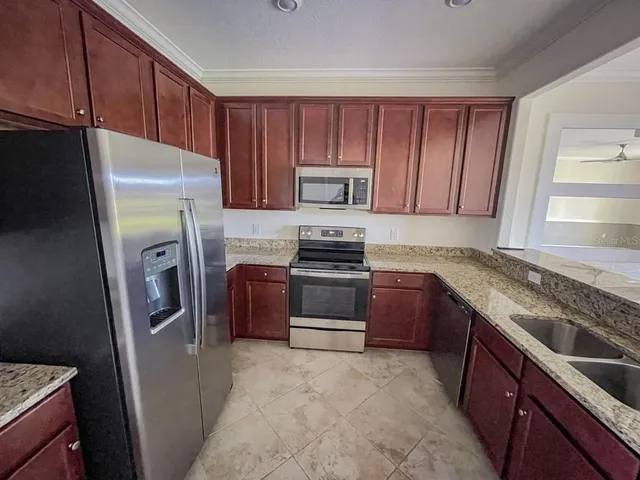 a view of an empty room and window in a room