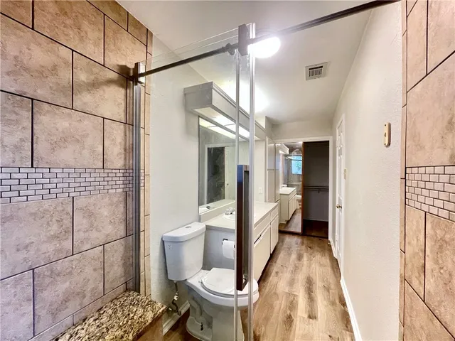 a bathroom with a sink and toilet