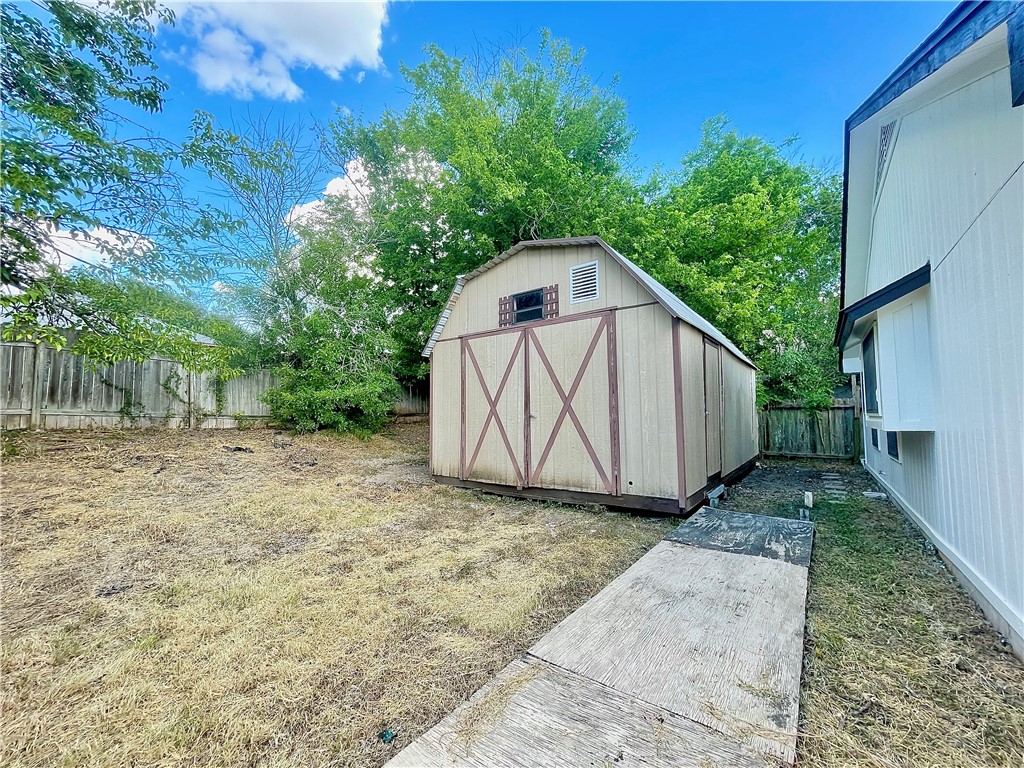 12333 Yarmont Way Austin, TX 78753 - Photo 40 of 40 a view of a house with a yard and large trees