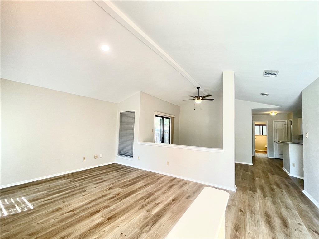 12333 Yarmont Way Austin, TX 78753 - Photo 5 of 40 a view of a bedroom with wooden floor