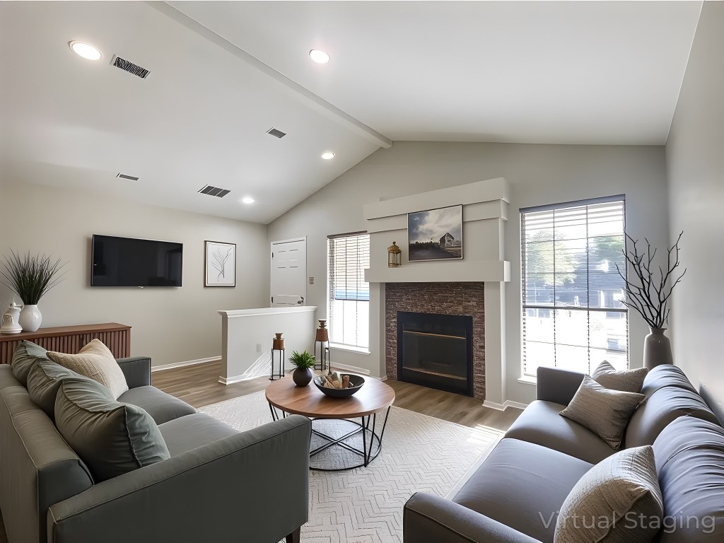 12333 Yarmont Way Austin, TX 78753 - Photo 7 of 40 a living room with furniture a fireplace and a flat screen tv