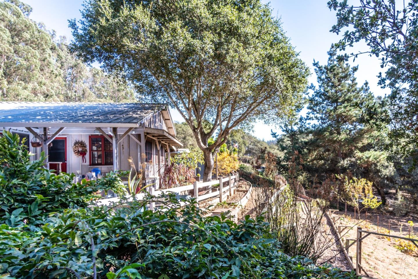 14520 Ridgecrest Road Watsonville, CA 95076 - Photo 2 of 49 an outdoor view of house with trees around