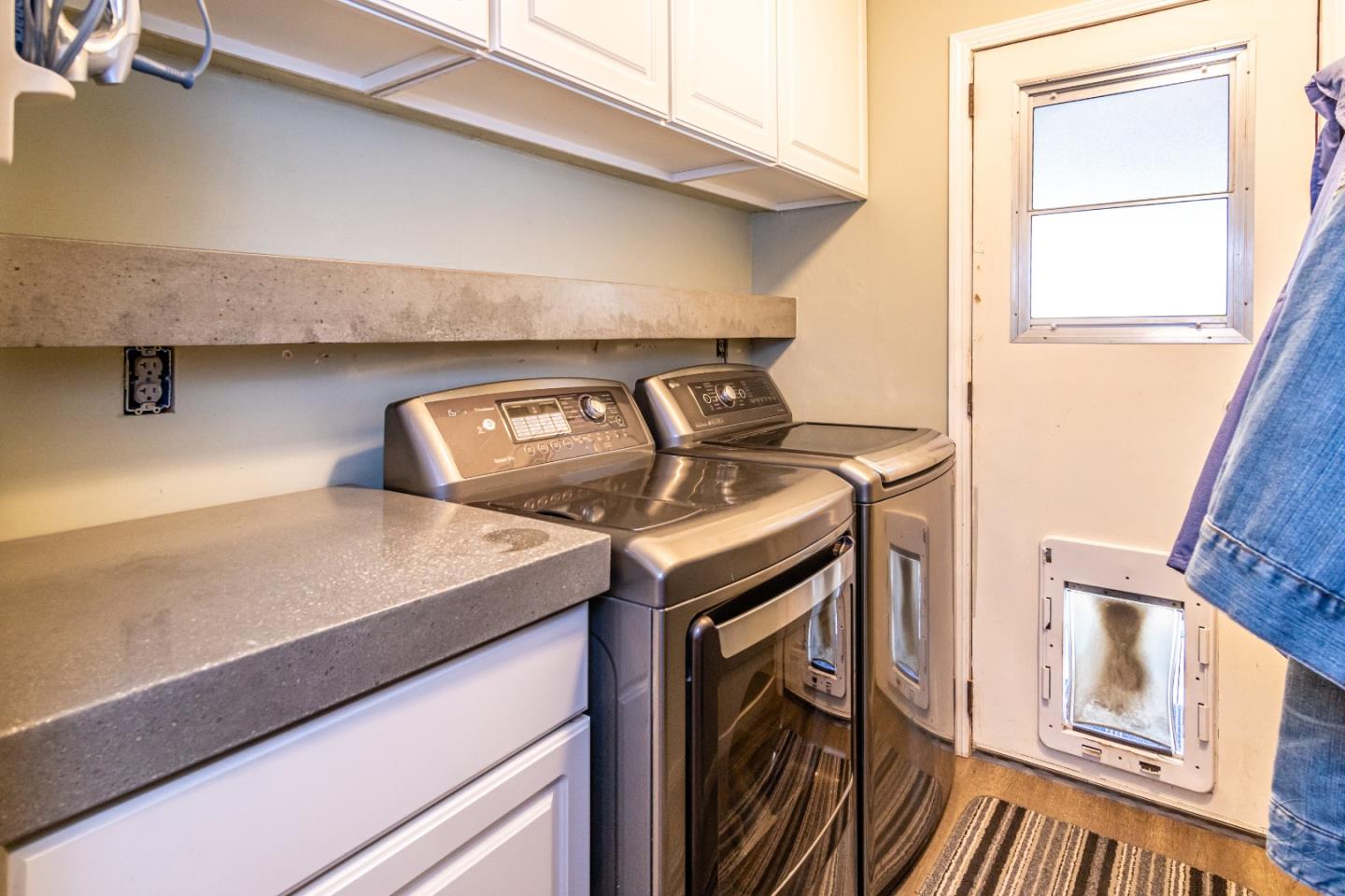 14520 Ridgecrest Road Watsonville, CA 95076 - Photo 24 of 49 a utility room with dryer and washer