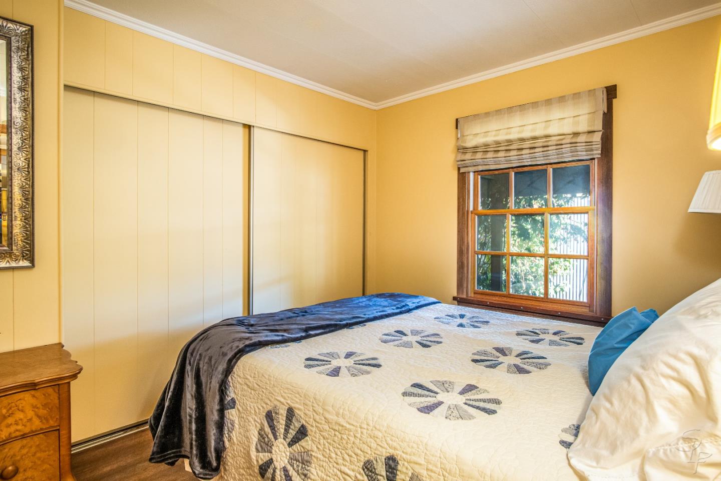14520 Ridgecrest Road Watsonville, CA 95076 - Photo 29 of 49 a bedroom with a bed and a window
