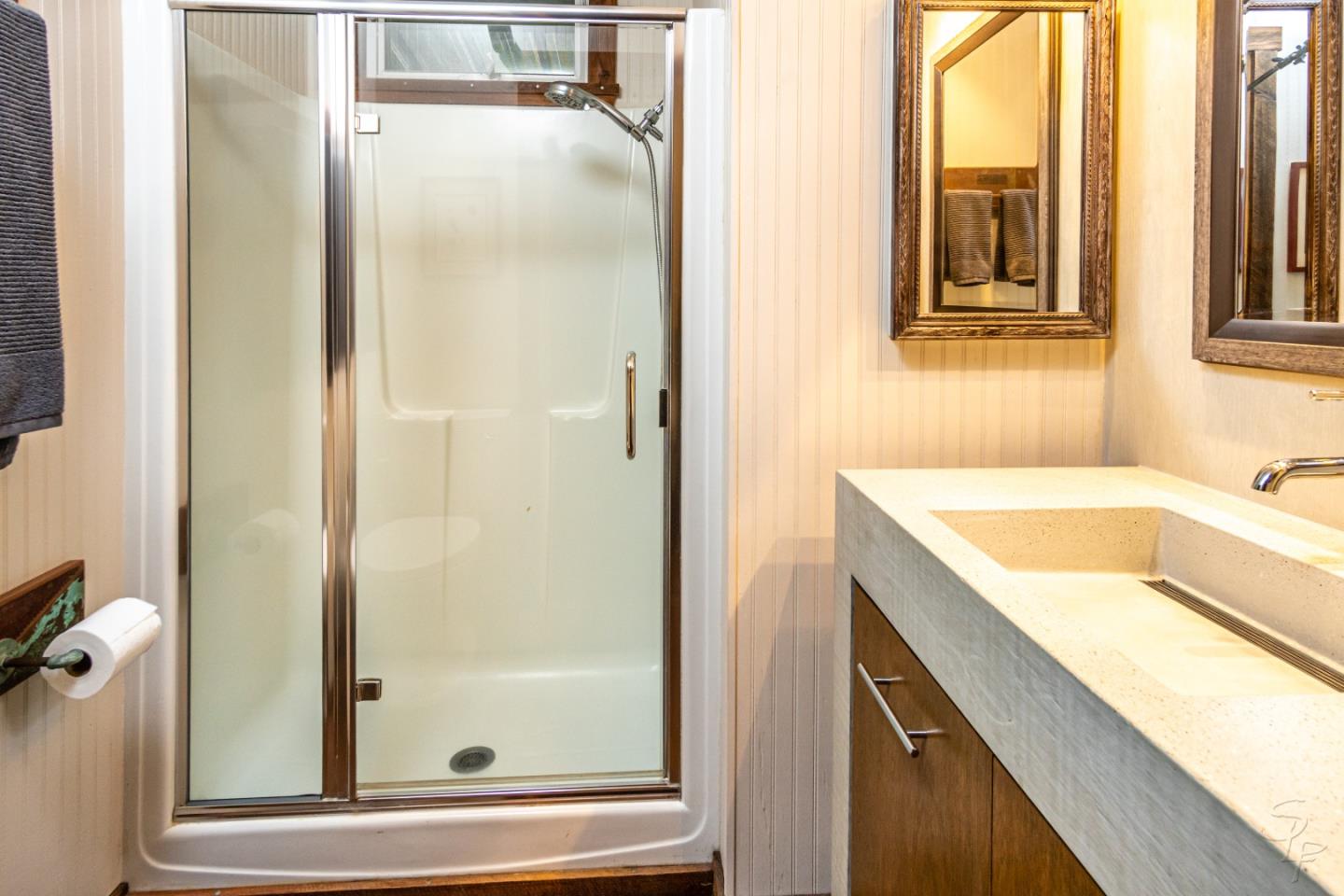 14520 Ridgecrest Road Watsonville, CA 95076 - Photo 30 of 49 a bathroom with a tub and shower