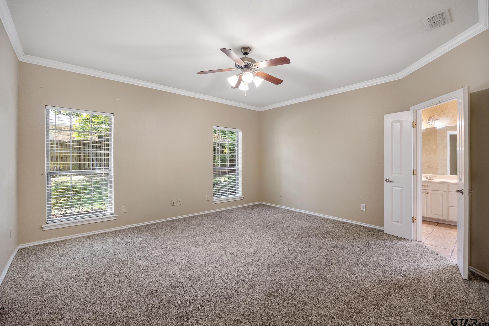 5603 Thomas Nelson Drive Tyler, TX 75707 - Photo 11 of 28 a view of an empty room with a window