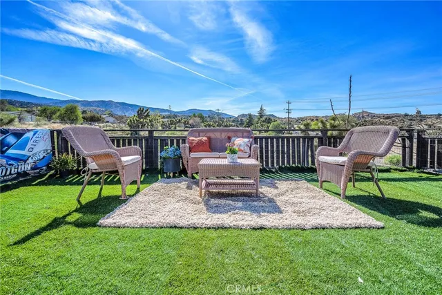 a garden view with a seating space