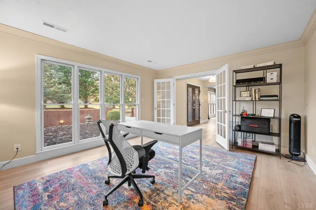 a bathroom with a sink mirror vanity and toilet